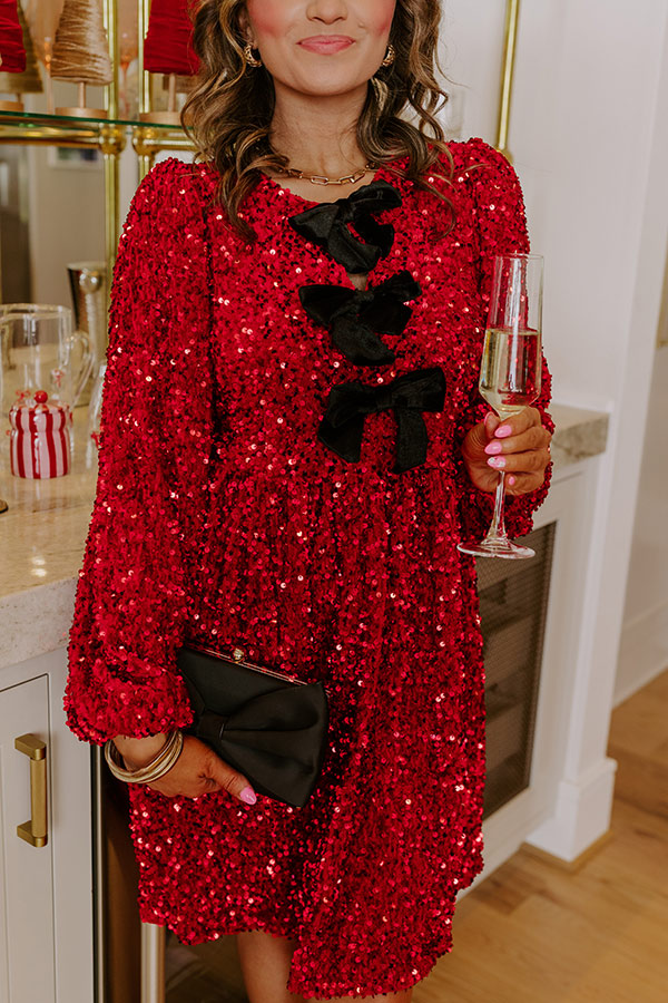 Petra Sequin Dress with Bow Detail and Flared Skirt