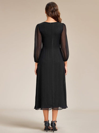 Phoebe Long Sleeve Dress with Twist Knot and Pleated Skirt