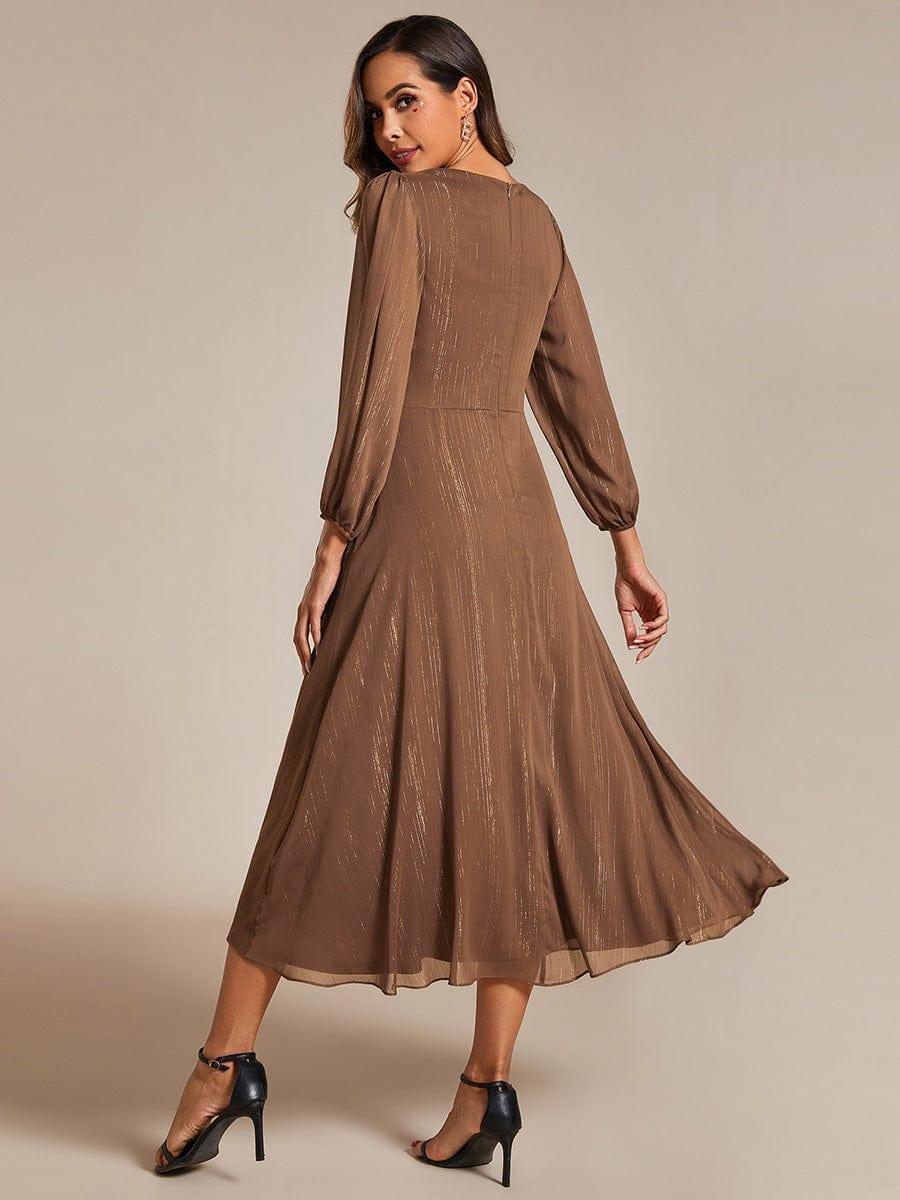 Phoebe Long Sleeve Dress with Twist Knot and Pleated Skirt