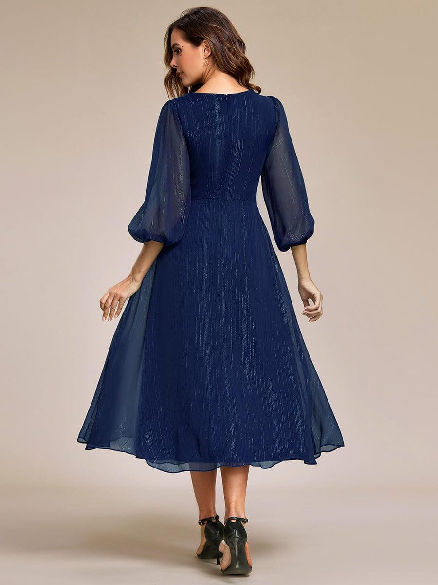Phoebe Long Sleeve Dress with Twist Knot and Pleated Skirt