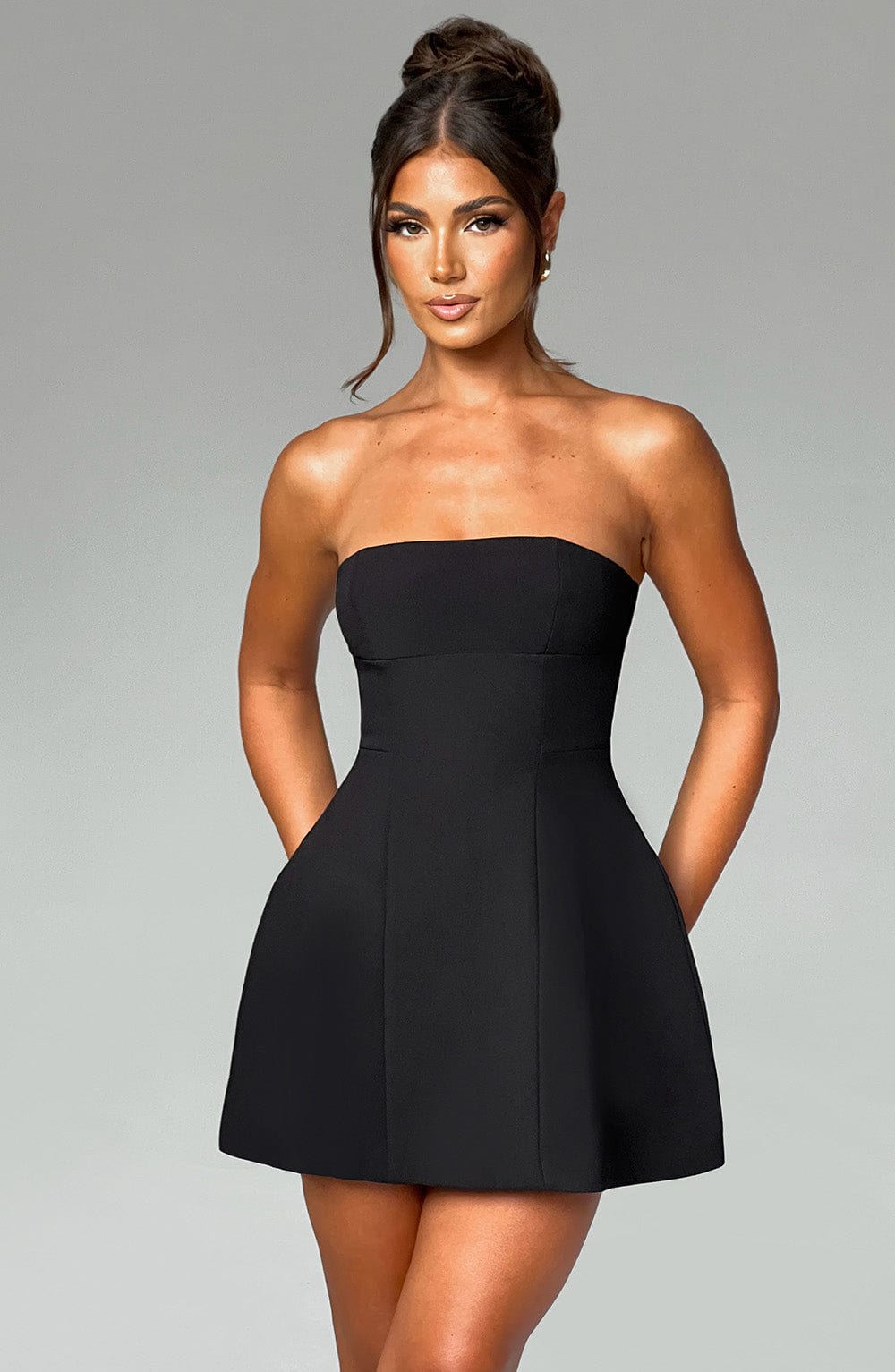 Cyra Black Mini Dress with Strapless Neck and Flared Skirt