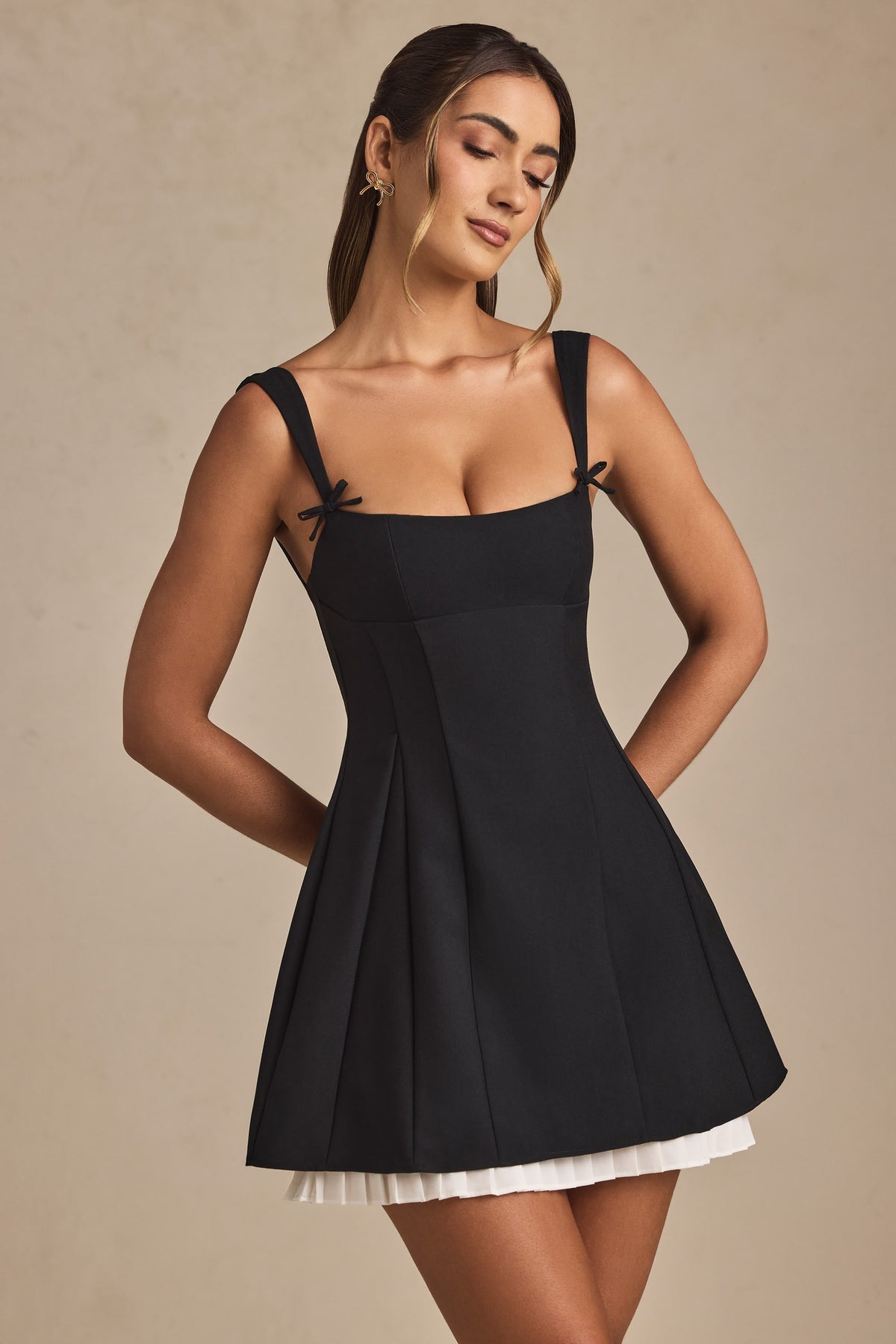 Anouska Black Mini Dress with Bow Straps and Pleated Skirt