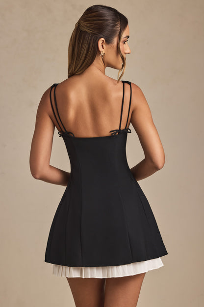 Anouska Black Mini Dress with Bow Straps and Pleated Skirt